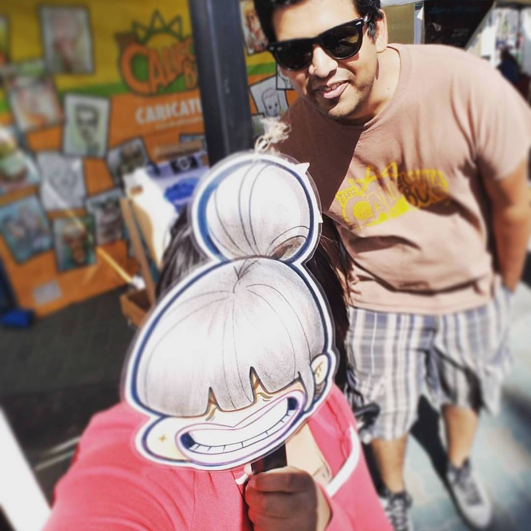 The California Boys' artists posing with the displays