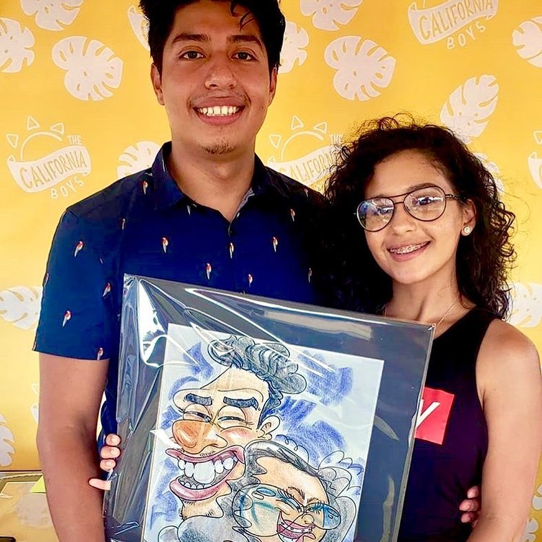 A young couple posing with