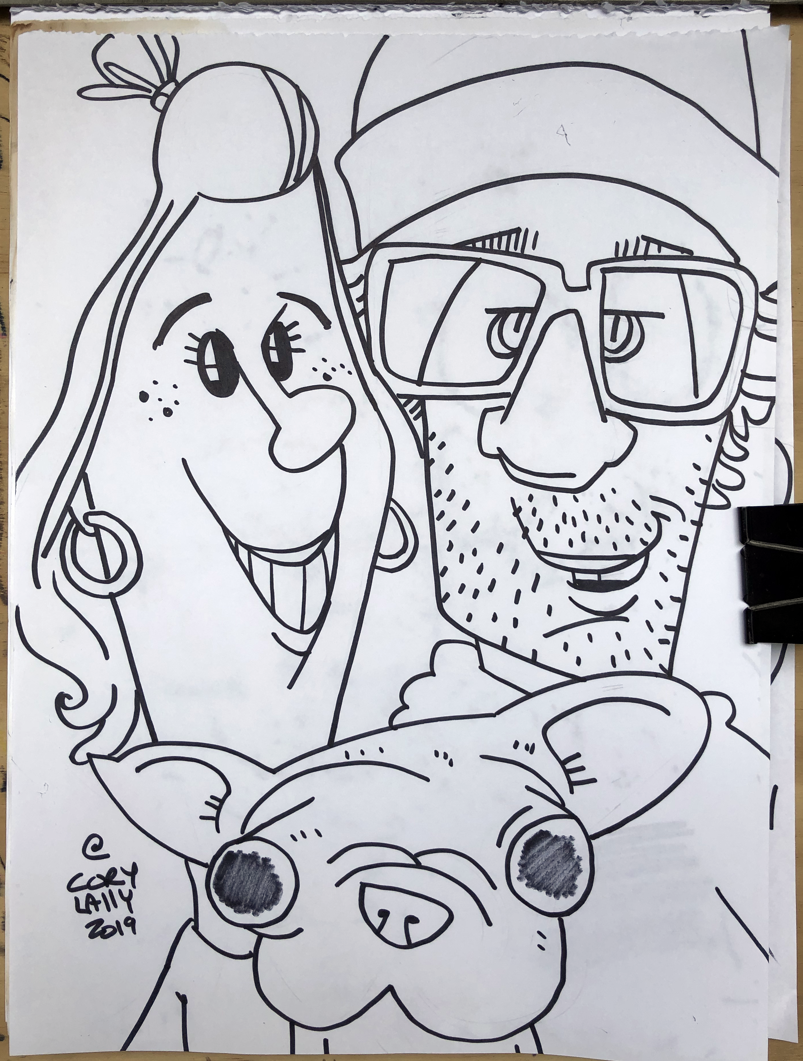 A black and white caricature of a couple and their dog