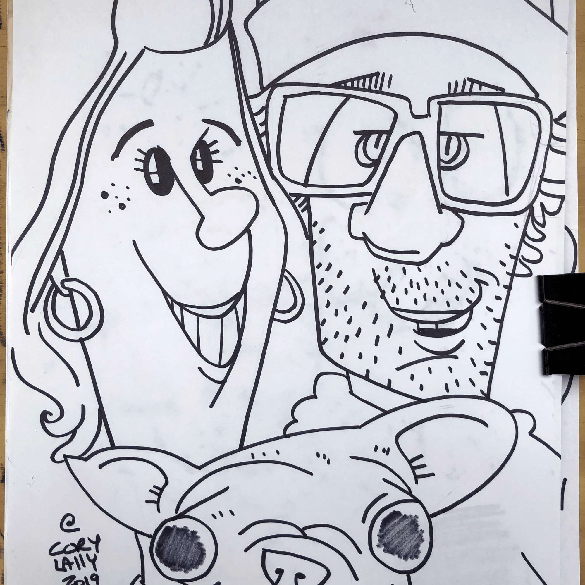 A black and white caricature of a couple and their dog