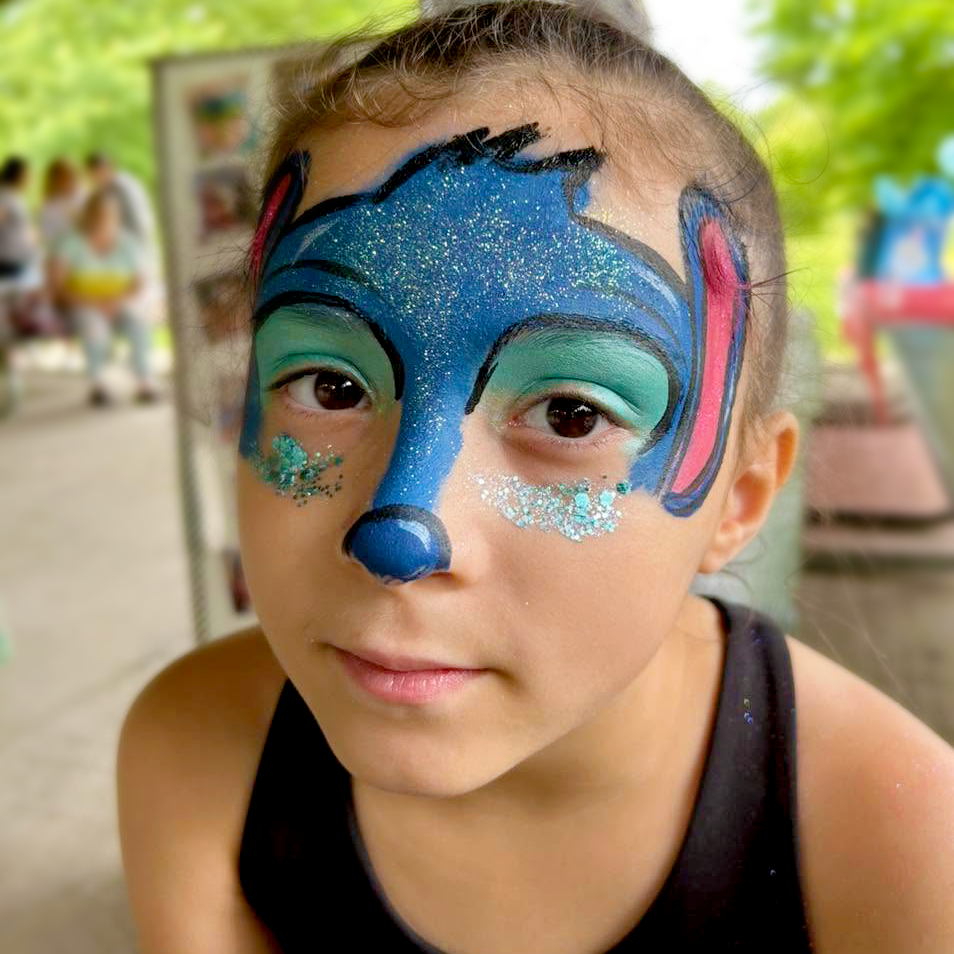 A Stitch inspired face painted mask.